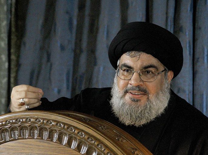 The head of Lebanon's militant Shiite Muslim movement Hezbollah, Hassan Nasrallah speaks during a rare live appearance from Beirut's southern suburb neighbourhood of Rweiss on November 13, 2013