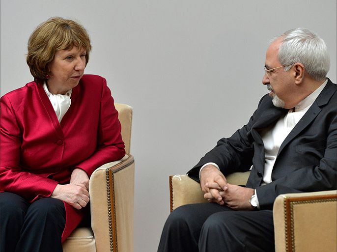 epa03939446 EU High Representative for Foreign Affairs Catherine Ashton (L) speaks with Iranian Foreign Minister Mohammad Javad Zarif during a photo opportunity prior the start of two days of closed-door nuclear
