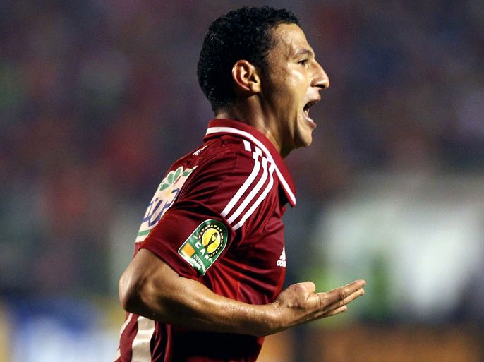 epa03944472 Al Ahly's Ahmed Abdelzaher celebrates after scoring a goal during the CAF Champions League second leg final match between South Africa's Orlando Pirates and Egyptian team Al-Ahly at the Arab Contractors stadium in Cairo, Egypt, 10 November 2013. Defending champions al-Ahly of Egypt won their eighth African Champions League title by beating Orlando Pirates of South Africa 2-0 in the second leg of the final in Cairo. EPA/KHALED ELFIQI