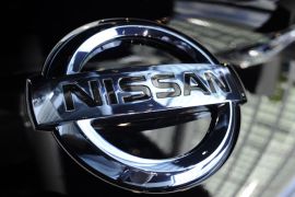 epa03931976 (FILE) A file picture dated 27 July 2011 shows the Nissan logo on a vehicle on display at the company headquarters' showroom in Yokohama, near Tokyo, Japan. Nissan Motor Co said 01 November 2013 that it had cut its net profit forecast for the current financial year to 355 billion yen (3.62 billion dollars) from 420 billion yen due to weak sales in Asia. EPA/FRANCK ROBICHON