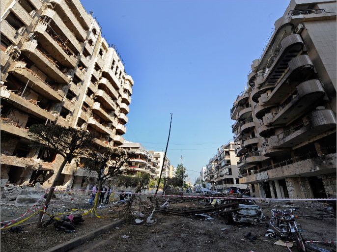 epa03958035 A general view of the site that was rocked by two suicide explosions a day earlier, near the Iranian embassy in south Beirut, Lebanon, 20 November 2013. Twenty-four people were killed on 19 November in a twin suicide bombing on the Iranian embassy in Beirut that an al-Qaeda-linked group said was carried out in retaliation for the Lebanese Hezbollah militia's involvement in Syria's civil war. More than 146 people were injured. EPA/WAEL HAMZEH