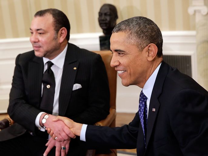 WASHINGTON, DC - NOVEMBER 22: U.S. President Barack Obama (R) meets with King Mohammed VI of Morocco (L) in the Oval Office November 22, 2013 in Washington, DC. The two leaders were expected to discuss a range of regional issues during their meeting. Win McNamee/Getty Images/AFP