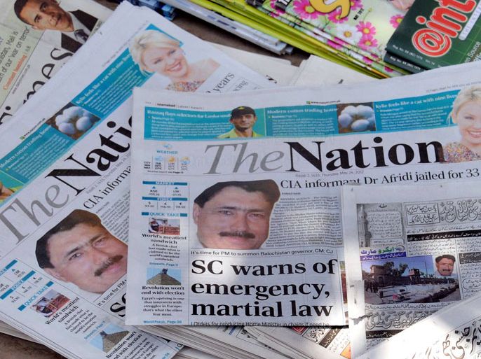 Pakistani newspapers carry front page news of the conviction of Dr. Shakeel Afridi, a Pakistani doctor accused of helping the United States find former al-Qaeda leader Osama bin Laden, in Peshawar, Pakistan, 24 May 2012. Shakeel Afridi, who was arrested after bin Laden was killed by US special forces in a Pakistani town last May, was sentenced to 33 years in Jail, under treason laws. He was accused of carrying out a fake vaccination campaign on behalf of the CIA, which helped the US intelligence agency track bin Laden. EPA/BILAWAL ARBAB