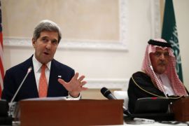 .S. Secretary of State John Kerry speaks near Saudi Foreign Minister Prince Saud al-Faisal (R) during a joint press conference November 4, 2013 in Riyadh. Kerry said the United States agrees with Saudi Arabia on Syria, adding Washington will "not stand idly" as Damascus continues to attack its own people. AFP PHOTO