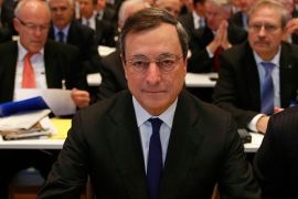 Mario Draghi, President of the European Central Bank (ECB) waits to deliver his speech to the European Banking Congress, at the old opera house in Frankfurt, November 22, 2013. Draghi said on Friday that in addition to national backstops, joint European backstops need to be in place before the