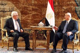 epa03806521 Egyptian interim President Adli Mansour (R) meets with Palestinian President Mahmoud Abbas (L) in Cairo, Egypt 29 July 2013.