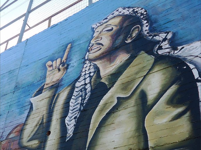 لوحدة جدارية للرئيس ياسر عرفات وتظهر وكأنه يقول أن العهد هو العهد وهي مقولته المشهورة - الجدارية بمدينة نابلس