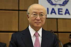 International Atomic Energy Agency (IAEA) General-Director Yukiya Amano arrives for the Board of Governors meeting at the UN atomic agency headquarters in Vienna on November 28, 2013. AFP PHOTO /