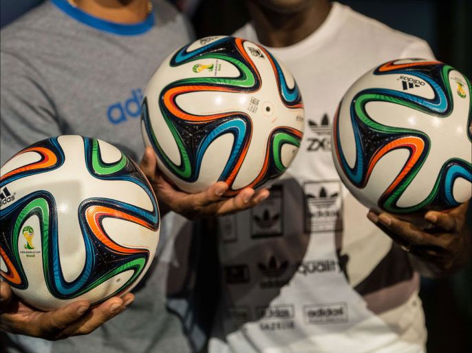 Brazuca --the official ball for the Brazil 2014 FIFA World Cup-- during its launch in Rio de Janeiro, Brazil, on December 3, 2013. AFP PHOTO / YASUYOSHI CHIBA