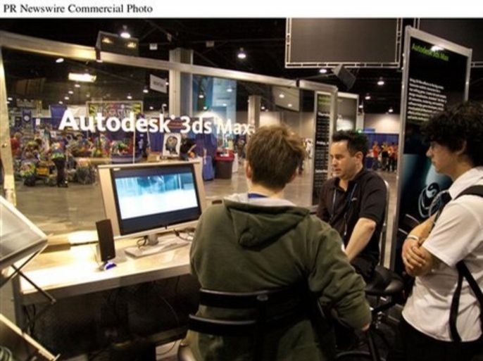 An Autodesk mentor demonstrates Autodesk 3DS Max animation software to high school students participating in the FIRST Robotics Competition.