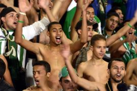 Supporters of Raja Casablanca cheer prior to the semi final match between Raja Casablanca and Atletico Mineiro at the FIFA Club World Cup in Marrakech, Morocco, 18 December 2013.
