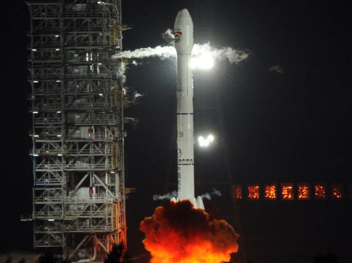 A Chinese Long March-3B carrier rocket blasts off with Bolivia's first telecommunications satellite on December 21, 2013 from the Xichang satellite launch centre in China's southwestern Sichuan province. The satellite, which is expected to be operational in March 2014, has cost USD300 million (220 million euros) and has been 85 percent financed by a loan from the Chinese Development Bank. CHINA OUT AFP PHOTO