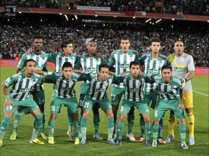 Morocco's Raja Casablanca players pose for a group picture before their semi-final football match against Atletico Mineiro as part of FIFA Club World Cup in Marrakesh on December 18, 2013. The regional champions from each of the FIFA regions are