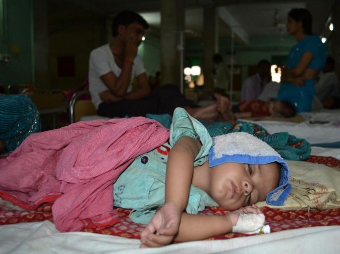 An Indian child suffering from Japanese Encephalitis lies on a bed at The Baba Raghav Das Medical College in Gorakhpur, some 250 kilometers (155 miles) southeast of Lucknow on June 11, 2012. The death toll due to the viral disease has risen to 88 in eastern Uttar Pradesh alone this year, according to the Press Trust of India. As many as 346 patients with symptoms of encephalitis have been admitted to the hospital so far this year, with most of the cases reported of water-borne encephalitis.