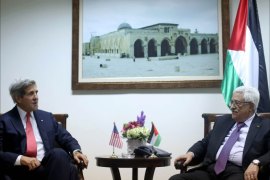 epa03988170 Palestinian President Mahmoud Abbas (R) meets with US Secretary of State John Kerry (L) in the West Bank city of Ramallah, 12 December 2013. Kerry arrived in Israel on 12 December to push Israeli and Palestinian leaders on