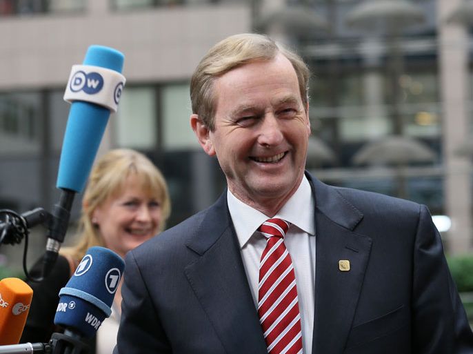 epa03922387 Irish Prime Minister Enda Kenny arrives for the European Council summit at the European Council headquarters in Brussels, Belgium, 24 October 2013. The European Council Summit on 24 and 25 October will focus on economic and social policy issues, the economic and monetary union, as well as migratory flows and migration policy. EPA/JULIEN WARNAND
