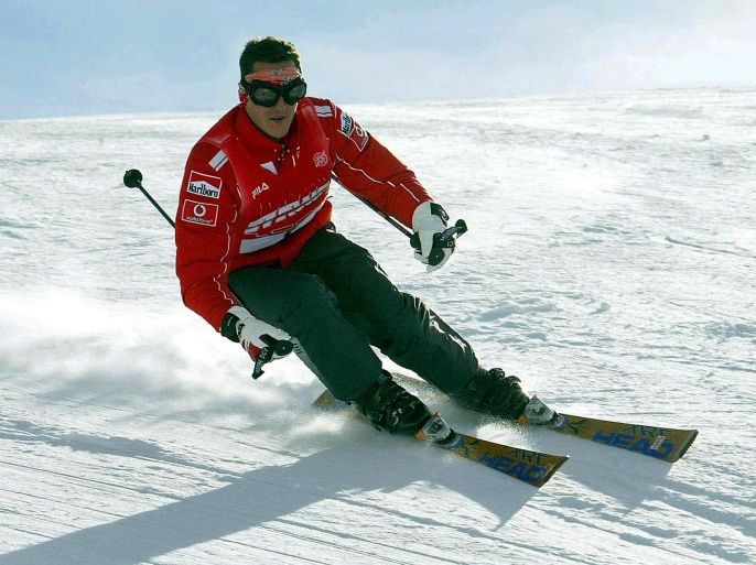 Then Ferrari's Michael Schumacher skis during a stay in the northern Italian resort of Madonna Di Campiglio in this January 16, 2004 file photo. REUTERS/Pool
