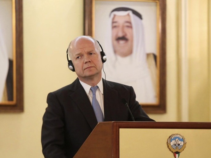 Britain's Foreign Secretary William Hague looks on during a joint news conference with Kuwait's Minister of Foreign Affairs Sheikh Sabah al Khalid al Sabah (not pictured) in Kuwait City December 6, 2013. REUTERS/Stephanie McGehee (KUWAIT - Tags: POLITICS)