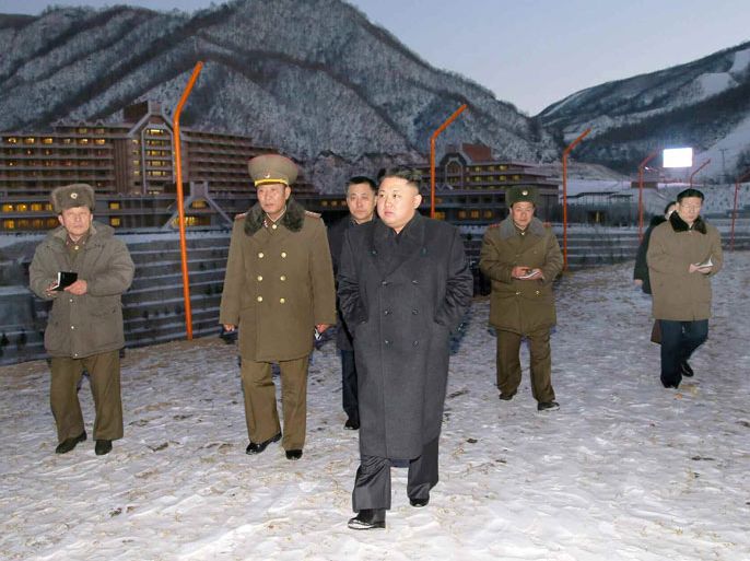 A picture made available on 15 December 2013 shows North Korean leader Kim Jong-un (C) visiting a ski resort under construction near the Mount Masik pass, or Masikryong, in the North's Kangwon Province, marking his second public activity after the execution of his uncle Jang Song-thaek. This photo is taken from the 15 December 2013 edition of Pyongyang's Rodong Sinmun. EPA/Rodong Sinmun / HANDOUT SOUTH KOREA OUT EDITORIAL USE ONLY/NO SALES