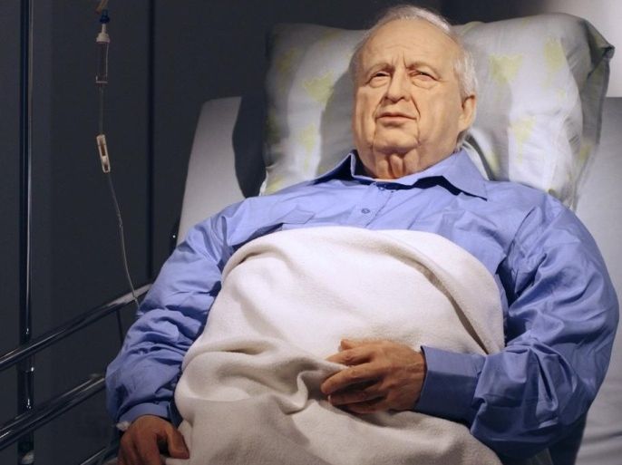An art installation depicting former Israeli Prime Minister Ariel Sharon lying comatose in a hospital bed is displayed before it's official opening at the Kishon Gallery in Tel Aviv October 18, 2010. Israeli artist Noam Braslavsky created the life-size installation of Sharon, who has been in a coma since suffering a massive stroke in January 2006. The exhibit opens to the public on Thursday.