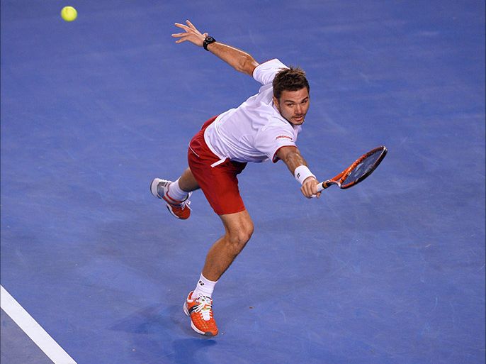 Switzerland's Stanislas Wawrinka plays a shot during his men's singles semi-final match against Czech Republic's Tomas Berdych on day eleven of the 2014 Australian Open tennis tournament in Melbourne on January 23, 2014.