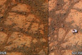 This composite image provided by NASA shows before and-after images taken by the Opportunity rover. At left is an image of a patch of ground taken on Dec. 26, 2013. At right is in image taken on Jan. 8, 2014 showing a rock shaped like a jelly doughnut that had not been there before. The space agency said the rover Opportunity likely kicked up the rock into its field of view. Opportunity landed on Mars in 2004 and continues to explore. (AP Photo/NASA)
