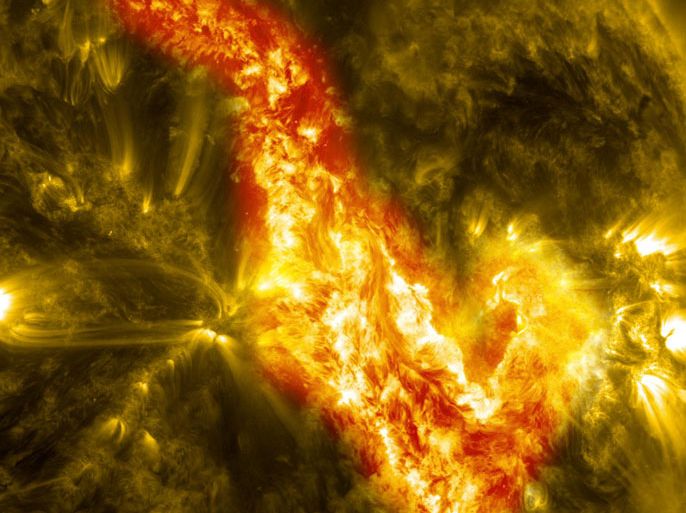 epa03924947 A picture made available on 25 October 2013 and captured on Sept. 29-30, 2013, by NASA's Solar Dynamics Observatory, or SDO, which constantly observes the sun in a variety of wavelengths shows a magnetic filament of solar material erupting on the sun in late September. The 200,000 mile long filament ripped through the sun's atmosphere, the corona, leaving behind what looks like a canyon of fire. The glowing canyon traces the channel where magnetic fields held the filament aloft before the explosion. In reality, the sun is not made of fire, but of something called plasma: particles so hot that their electrons have boiled off, creating a charged gas that is interwoven with magnetic fields. EDITORIAL USE ONLY