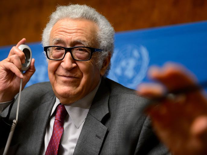 UN-Arab League envoy for Syria Lakhdar Brahimi gestures during a press briefing on the third day of face-to-face peace talks at the United Nations Offices in Geneva on January 27, 2014. Syrian peace talks in Geneva were deadlocked after a session Monday aimed at tackling the explosive issue of a transfer of power, delegation sources from the warring sides said. AFP PHOTO / FABRICE COFFRINI