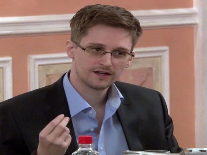 In this image made from video released by WikiLeaks on Friday, Oct. 11, 2013, former National Security Agency systems analyst Edward Snowden speaks during a presentation ceremony for the Sam Adams Award in Moscow, Russia. Should Snowden ever return to the U.S., he would face criminal charges for leaking information about NSA surveillance programs. But legal experts say a trial could expose more classified information as his lawyers try to build a case in an open court that the operations he exposed were illegal. (AP Photo)