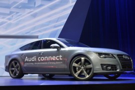 Audi's autonomous car drives on stage during the Audi keynote at the International Consumer Electronics Show, Monday, Jan. 6, 2014, in Las Vegas. (AP Photo/Jack Dempsey)