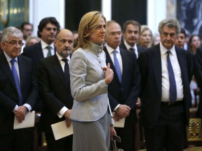 GRA228 - Madrid, -, SPAIN : (FILES)-- A file photo taken on June 20, 2013 shows Spanish Princess Cristina attending a mass commemorating the centenary of the birth of Don Juan de Borbon at the chapel of the Royal Palace in Madrid . Spanish King Juan Carlos' youngest daughter Cristina has been summoned to face tax crime and money-laundering charges, a court on the island of Majorca said Tuesday. Cristina, 48, would be the first direct relative of the king ever to appear in court accused of wrongdoing. She has been linked to the business affairs of her husband Inaki Urdangarin, who is under investigation for alleged embezzlement of public funds. AFP PHOTO / POOL / JUAN CARLOS HIDALGO