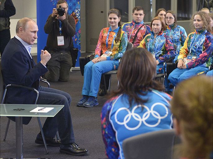 Russian President Vladimir Putin meets upcoming Olympic games' volunteers in Sochi on January 17, 2014