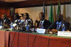 (L-R) East Africa's IGAD exective secretary Mahmoud Maalim, acting head of South Sudan's delegation Makuei Lueth, IGAD envoy Lazarus Sumbeiywo, IGAD envoy Seyoum Mesfim, IGAD envoy Mohamed Ahmed al-Dabi, head of South Sudan's rebel delegation Taban Deng hold a joint press conference in the Ethiopian capital Addis Ababa on January 6, 2014. South Sudan's government and rebels have finally begun formal peace talks in Addis Ababa aimed at ending more than three weeks of unrest, Ethiopia's government spokesman said. AFP PHOTO/JACEY FORTIN