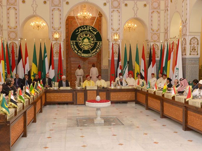 -, MOROCCO : The Moroccan King Mohammed VI (C) chairs the al-Quds (meaning Jerusalem) Committee Meeting in Support of Middle East Peace Process on January 17, 2014 at the royal palace in Marrakesh. At least 15 representatives from islamic countries are expected to attend this 20th edition that was set up in 1975 to preserve Jerusalem heritage sites. AFP PHOTO / FADEL SENNA