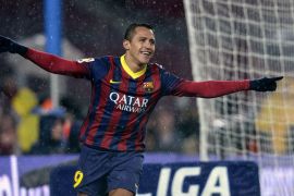 LLG1822 - Barcelona, -, SPAIN : Barcelona's Chilean forward Alexis Sanchez celebrates after scoring a goal during the Spanish Copa del Rey (King's Cup) quarterfinal second-leg football match FC Barcelona vs Levante UD at the Camp Nou stadium in Barcelona on January 29, 2014. AFP PHOTO/ LLUIS GENE