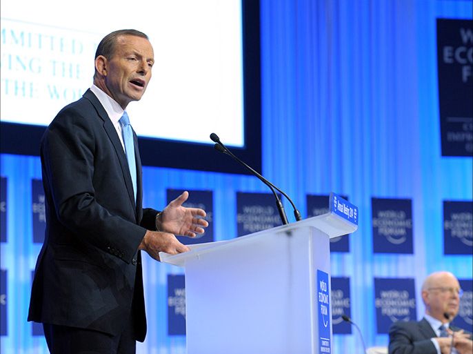 Australian Prime Minister Tony Abbott addresses the World Economic Forum in Davos on January 23, 2014. Some 40 world leaders gather in the Swiss ski resort Davos to discuss and debate a wide range of issues includ