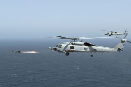This April 23, 2008 US Navy photo shows an MH-60R Seahawk firing a Hellfire missile during training near San Diego, California. The United States will speed up delivery of missiles and surveillance drones to Iraq as the Baghdad government battles a resurgence of Al-Qaeda linked militants, a Pentagon spokesman said January 6, 2014. "We are ... looking to accelerate the FMS (Foreign Military Sales) deliveries with an additional 100 Hellfire missiles ready for delivery this spring," Colonel Steven Warren said. An additional 10 ScanEagle surveillance drones would also be delivered he said. Hellfire missiles, originally designed as an anti-tank weapon, can be fired from helicopters or airplanes. ScanEagle drones are a low-cost three-meter aircraft capable of flying 24 hours. AFP PHOTO / Handout / US Navy / MC2 Mark A. Leonesio == RESTRICTED TO EDITORIAL USE / MANDATORY CREDIT: "AFP