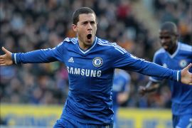 Chelsea's Belgian midfielder Eden Hazard celebrates scoring the opening goal of the English Premier League football match between Hull City and Chelsea at The KC Stadium in Hull on January 11, 2014