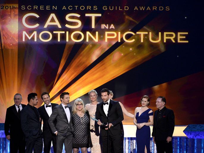 WXG390 - Los Angeles, California, UNITED STATES : (L-R) Actors Robert De Niro, Michael Pena, Alessandro Nivola, Jeremy Renner, Colleen Camp, Elisabeth Rohm, Bradley Cooper, Jennifer Lawrence, Amy Adams, and Paul Herman accept the Outstanding Performance by a Cast in a Motion Picture award for 'American Hustle' onstage during the 20th Annual Screen Actors Guild Awards at The Shrine Auditorium on January 18, 2014 in Los Angeles, California. Kevork Djansezian/Getty Images/AFP== FOR NEWSPAPERS, INTERNET, TELCOS & TELEVISION USE ONLY ==