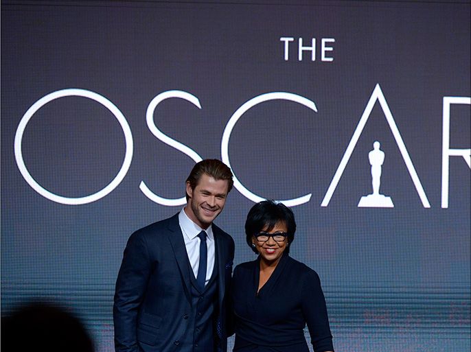 epa04024414 Australian actor Chris Hemsworth (L) and Academy President Cheryl Boone Isaacs (R) announce the nominations for the 86th Academy Awards in Los Angeles, California USA, 16 January 2014. The Academy Awards for outstanding film achievements of 2013 will be presented on 02 March 20014. EPA/PAUL BUCK