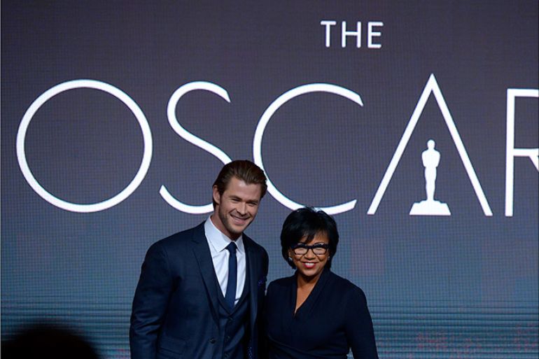 epa04024414 Australian actor Chris Hemsworth (L) and Academy President Cheryl Boone Isaacs (R) announce the nominations for the 86th Academy Awards in Los Angeles, California USA, 16 January 2014. The Academy Awards for outstanding film achievements of 2013 will be presented on 02 March 20014. EPA/PAUL BUCK