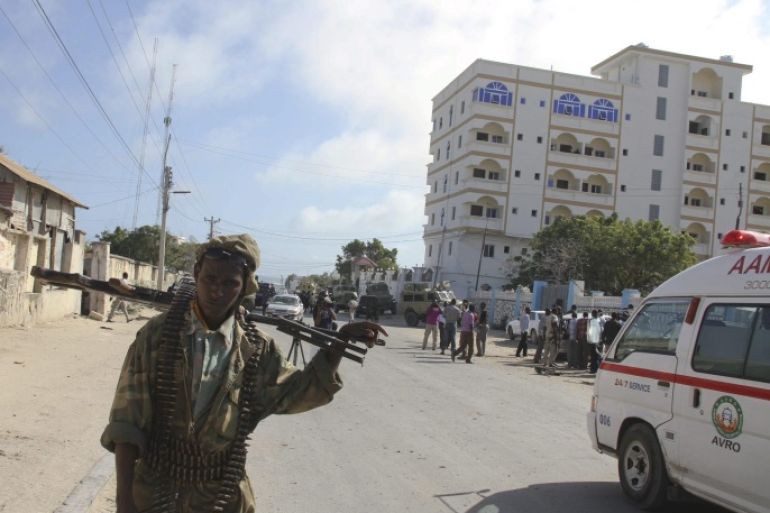 (FILE) A file photo dated 12 September 2012 shows a Somali soldier in front of Jazeera Hotel in Mogadishu, Somalia, after two explosions rocked the hotel while the country's president Hassan Sheikh Mohamud and the Kenyan foreign minister Samson Ongeri were holding a meeting. According to media reports on 01 January 2014, two car bombs exploded outside the Jazeera Hotel late 01 January, killing at least 8 people. The blasts were followed by exchanges of heavy gunfire between the security forces and attackers, reports say. The al-Qaeda-linked Islamist militant group al-Shabab has claimed responsibility for the attack.