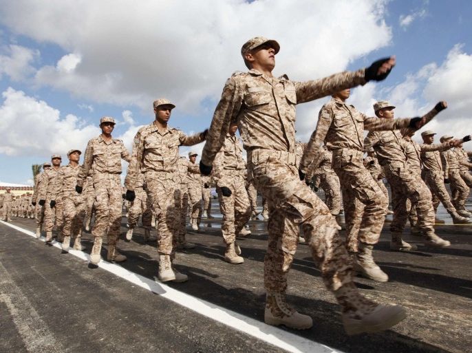 Soldiers march during a graduation ceremony for recruits of the Libyan army in Tripoli January 16, 2014. REUTERS/Ismail Zitouny (LIBYA - Tags: MILITARY POLITICS)