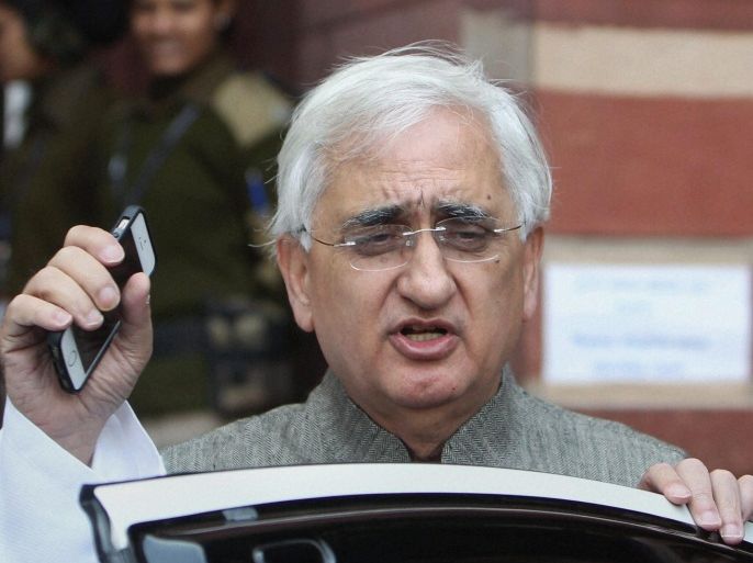 Indian Foreign Minister Salman Khurshid speaks outside his office in New Delhi, India, Saturday, Jan. 11, 2014. India’s government said Saturday there was no standoff with the United States over the arrest and strip search of an Indian diplomat in New York, appearing eager to defuse a nearly month-long controversy that has threatened bilateral ties. "There is no reason now to feel any immediate concern about any outcome that might be adverse or particularly disturbing in nature. In due course, we will take up all issues one by one and sort them out,’’ Khurshid said on Saturday. (AP Photo)