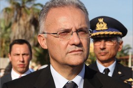 Italian Defence Minister Mario Mauro, attends a ceremony commemorating the migrants who drowned off the southern Italian island of Lampedusa in Agrigento, Sicily island, Italy, 21 October 2013. The ceremony was organized to commemorate two deadly shipwrecks, which happened on October 3 and October 11. EPA/MONTANA LAMPO