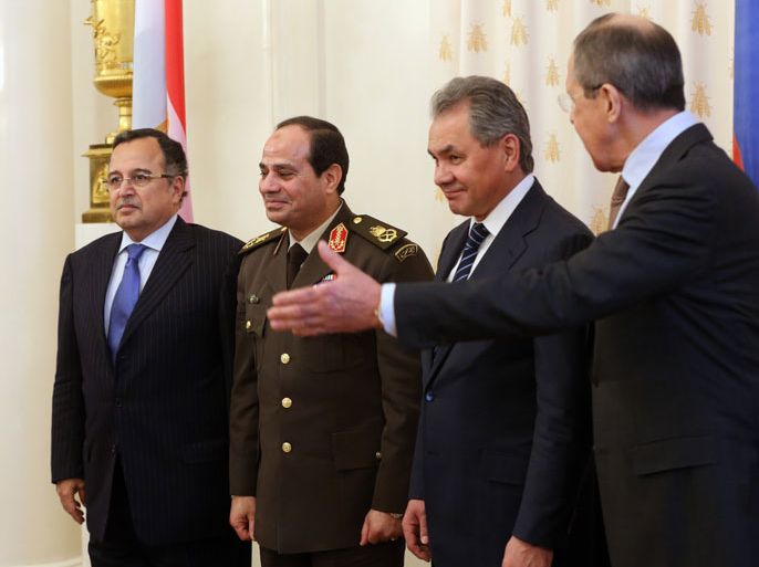 epa04073392 Russian Foreign Minister Sergei Lavrov (R), Russian Defense Minister Sergei Shoigu (2-R), Defense Minister of Egypt Abdulfattah Al Sisi (2-L) and Egyptian Foreign Minister Nabil Fahmi (L) pose for the media prior to their talks in the Russian Foreign ministry in Moscow, Russia, 13 February 2014