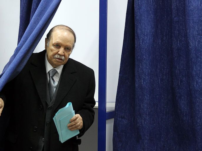 epa03490447 Algeria's President Abdelaziz Bouteflika comes out from a polling booth before casting his vote at a polling station in Algiers, Algeria, 29 November 2012
