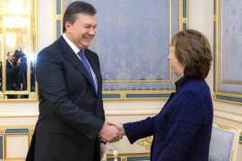 Ukrainian President Viktor Yanukovych (L) welcomes EU foreign policy chief Catherine Ashton prior their talks in Kiev on February 5, 2014. Catherine Ashton met Viktor Yanukovych on Wednesday in a fresh effort to resolve a two-month crisis as lawmakers battled over a deal to curb the president's powers.  Buoyed by support from Western dignitaries including the EU's Ashton, the opposition has accused Yanukovych of dragging his feet over proposals to end the worst standoff in Ukraine's history since the fall of the Soviet Union