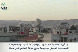 قصف داريا بالبراميل ومواجهات مع النظام بحماة