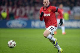 epa03968199 Manchester United player Wayne Rooney during the UEFA Champions League group A soccer match between Bayer Leverkusen and Manchester United in Leverkusen, Germany, 27 November 2013. EPA/FEDERICO GAMBARINI